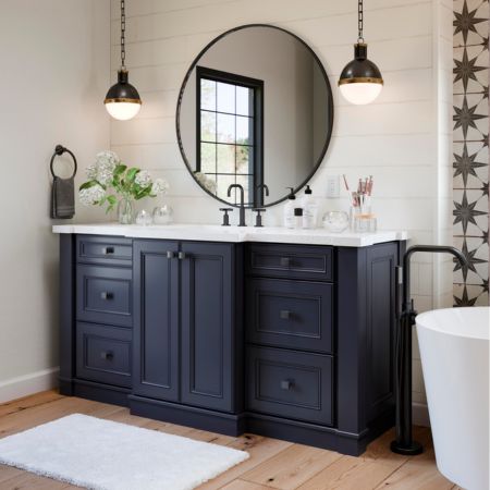 dark blue vanity in modern farmhouse bathroom